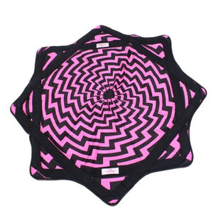 Pink and black spiral star-shaped object