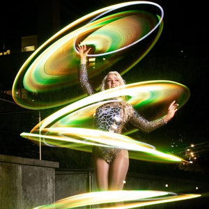 Woman with light-up hoops performing, CopyofIMG_1492