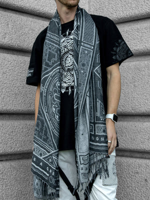 Man wearing DHARMA gray and white shawl