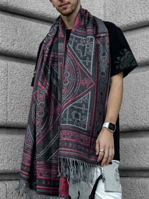 Man wearing gray and red Dharma shawl