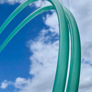 Turquoise hoops against a blue sky