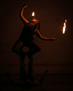 Fire eater with MoonBlaze fire torches, by FIRE MECCA.