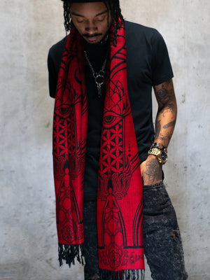Man wearing red mantra scarf