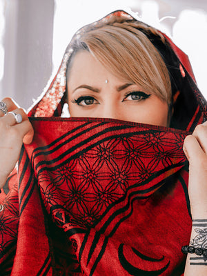 Woman with red mantra scarf