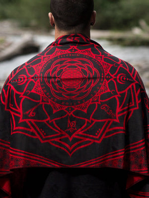 Red Mantra patterned shawl on a person