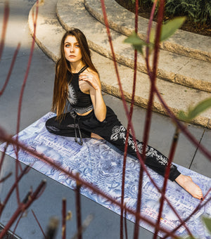 Woman in yoga pose on mat, New Edits Yoga 6