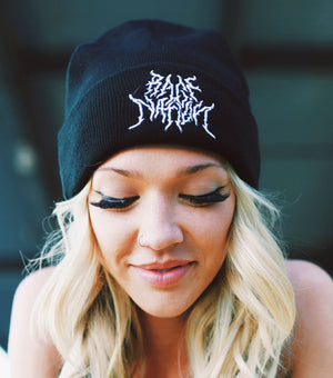 Woman wearing Rage Nation metal beanie