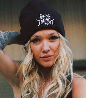 Woman wearing Rage Nation metal beanie