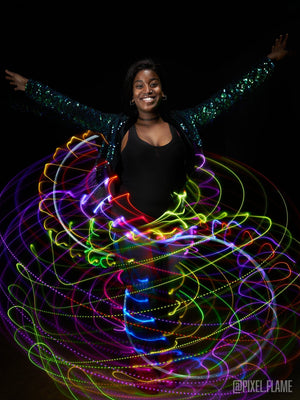 Woman in light ray skirt, starlight doubles.