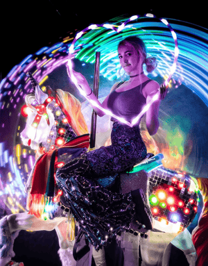 Woman on carousel with light-up hoop, Feb 14 screenshot.