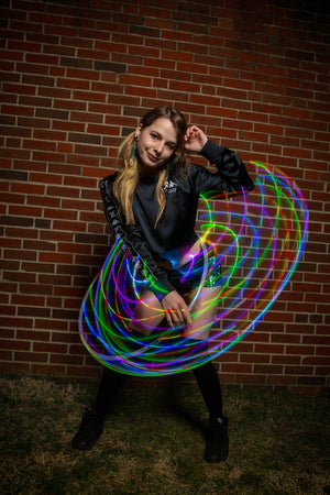 Mina V2b with Starlight2 LED hoop against brick wall