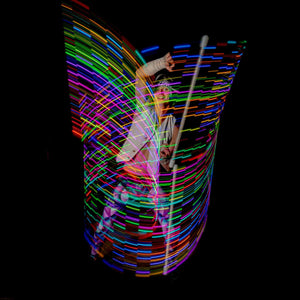 Tyler Wands performer with light trails