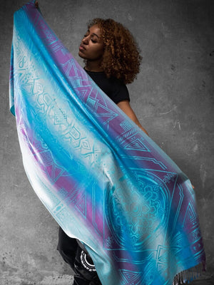 Woman holding blue dharma shawl