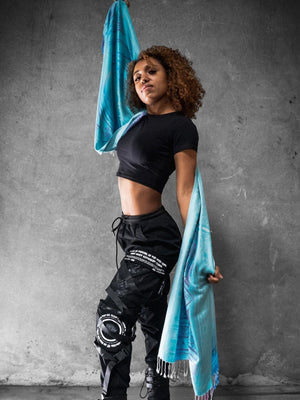 Woman holding blue dharma shawl