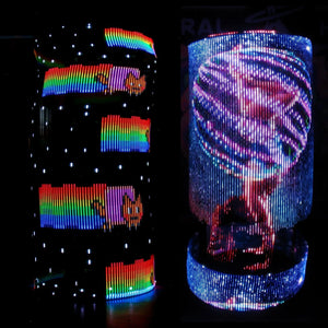 Cat Mary illuminated art installation with rainbow and face displays.