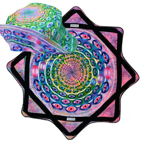 Eyes-themed fabric art with swirling patterns.