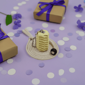 Yellow fire poi on purple surface with gifts