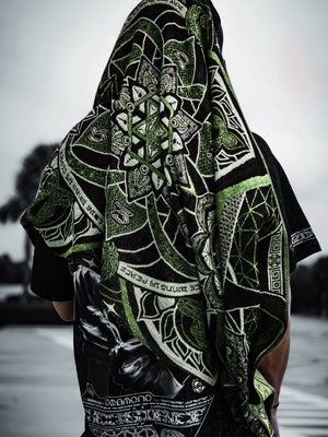Green shawl with intricate pattern, harmony design