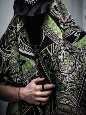 Green patterned shawl with black accents