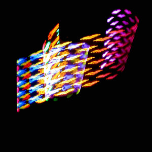 Abstract colorful light streaks on black