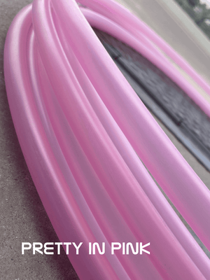 Pink tubing with Pretty in Pink text.