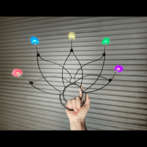 LED light flower sculpture held