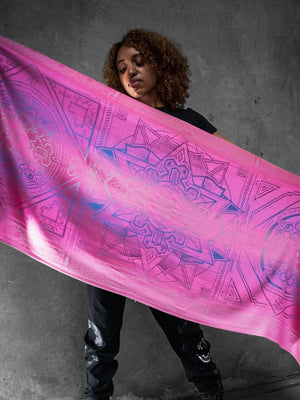 Woman holding pink dharma shawl