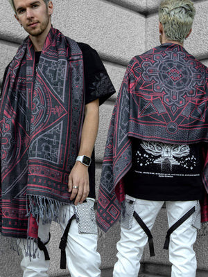 Man wearing rage dharma shawl, double view.