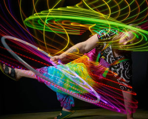 Starlight hula hoop performer with light trails