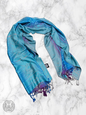 Teal Dharma shawl on marble