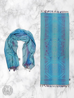 Teal Dharma shawl on marble background