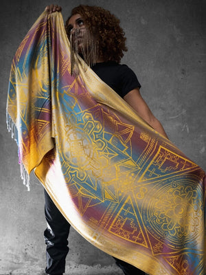 Person holding yellow Dharma shawl