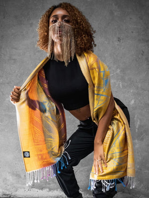 Woman wearing yellow dharma shawl