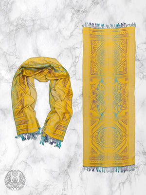 Yellow dharma shawl on marble background