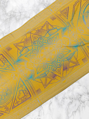 Yellow Dharma shawl on marble background