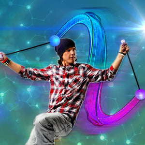 Poi spinner in action with glowing orbs