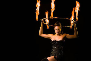 QW Fire performer with flaming hoop.